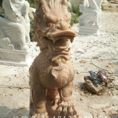 踩球麒麟雕塑，晚霞紅麒麟石雕