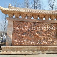 九龍影壁雕塑，晚霞紅石雕影壁