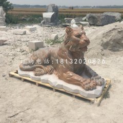 趴著的老虎石雕，晚霞紅動(dòng)物雕塑